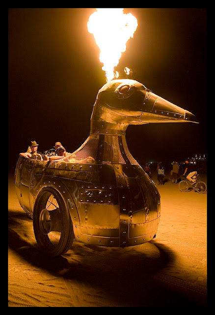 Giant Metallic Flaming Kinetic Duck by Bart Dorsa Travels on Carnet to Russia